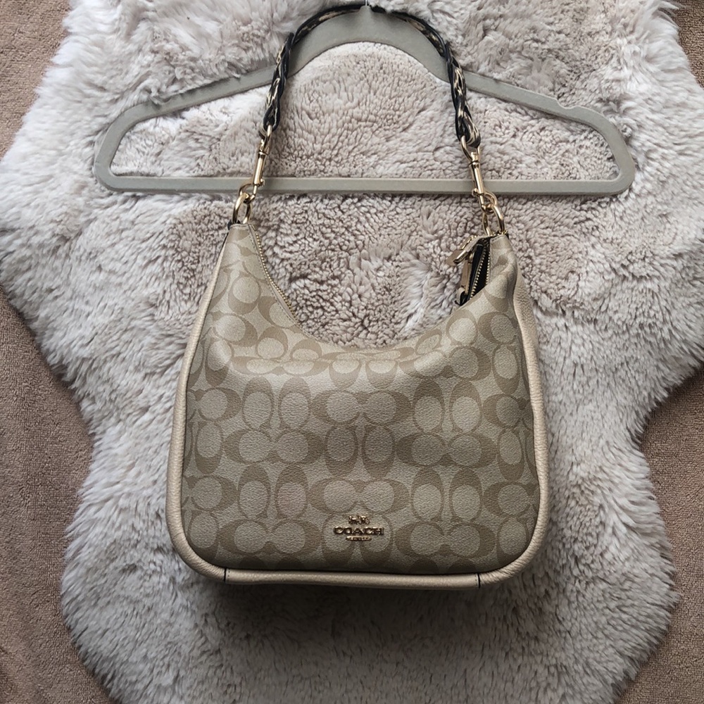 Coach purse, pebbled, leather canvas and snake skin. Not included and 50% off